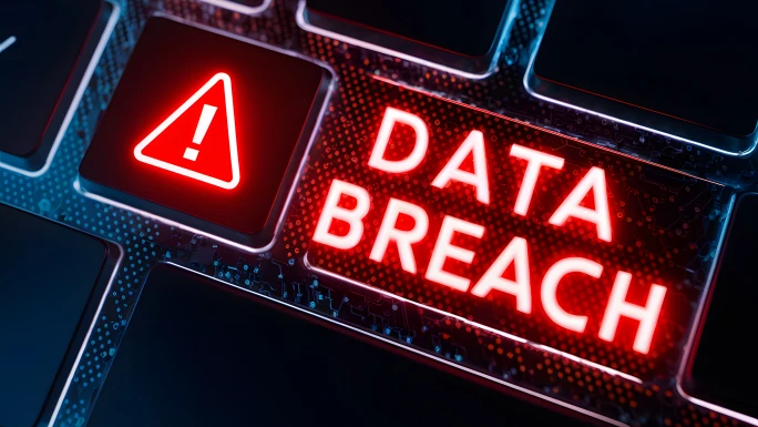 keyboard with red DATA BREACH warning